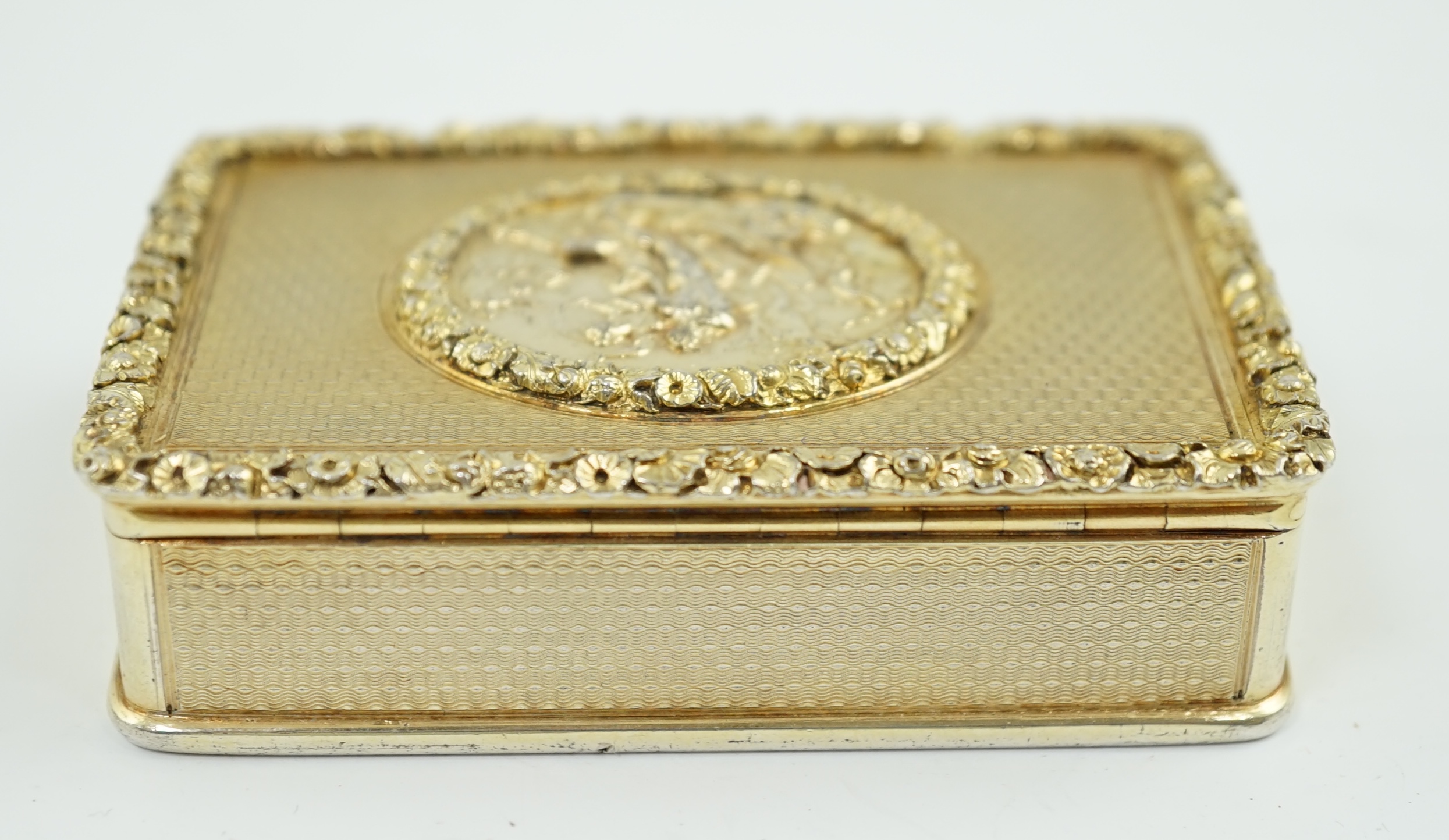 A late George III engine turned silver gilt rectangular snuff box, by William Snooke Hall